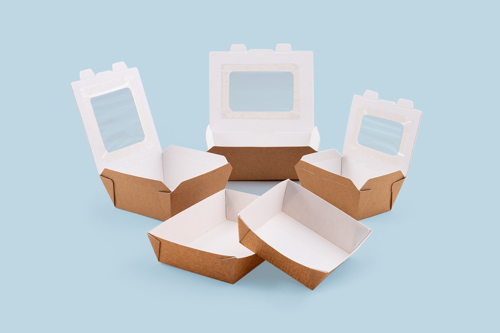 Selection of Flutepac corrugated paper trays, some with windows and lids, others as open trays.